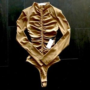 Brand new long sleeve mesh bodysuit!